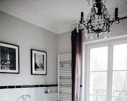 Marble bathtub in Parisian-inspired interior